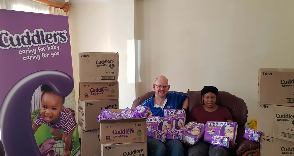 Cuddlers marketing manager Murray Booth with Prudence Buthelezi, after the first official Cuddlers donation to the quintuple